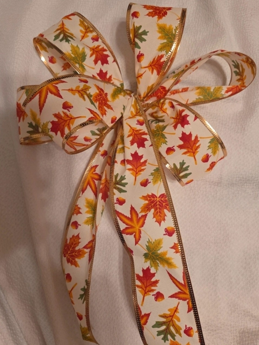 Festive Autumn Leaf Holiday Bow Ribbon - White with Orange, Red & Green Leaves